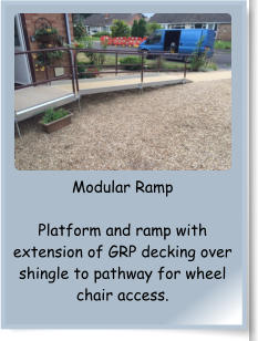 Modular Ramp  Platform and ramp with extension of GRP decking over shingle to pathway for wheel chair access.